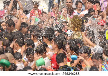 On Songkran day there are many traditional activities as well. Here, Buddhist devotees pour water on statues, one of Nong Khai,Thailand most revered statues.Taken on April 13,2014 in Thailand