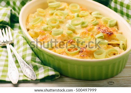 Similar – Image, Stock Photo Baking Potatoes And Leek Soup