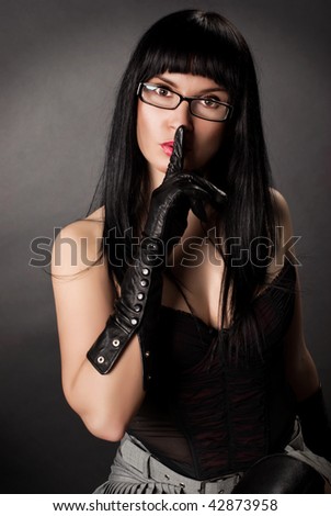 beauty pin up lady wearing gloves  on the black  background