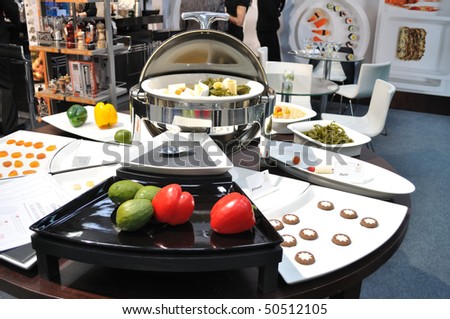 WARSAW - MARCH 26: Catering equipment for the presentation of food - 14th International Food Service Trade Fair. March 26, 2010 in Warsaw, Poland.
