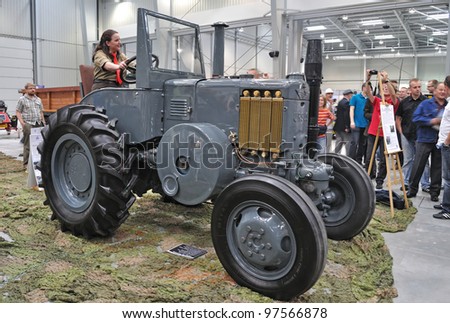 WARSAW - MAY 29: Restored model of the tractor Ursus C-45 (1947-1959) on display at the classic car exhibition MOTO NOSTALGIA on May 29, 2011 in Warsaw, Poland.