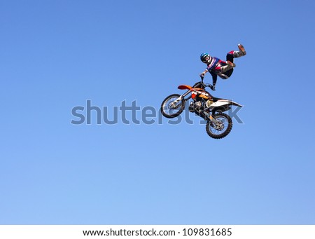 MOSCOW, RUSSIA - JULY 28 : Luzhniki, Massimo Bianconcini performs motorcycle stunt trick at Freestyle Motocross session during Moscow City Games on July 28, 2012 in Moscow.