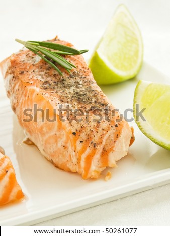 Plate with backed salmon steaks. Shallow dof.