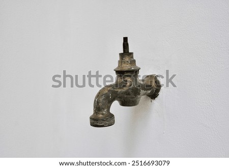 Similar – Foto Bild Wasserhahngriffe an der Wand im Badezimmer