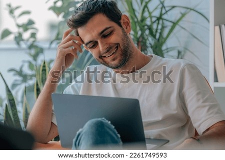 young man at home with computer Foto stock © 