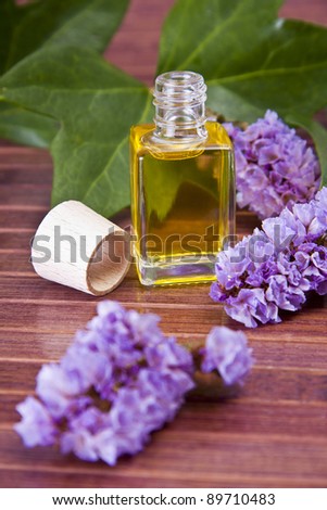 bottle of perfume oil in the environment of the spa