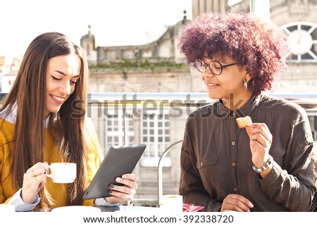 girls having coffee with the tablet Foto d'archivio © 