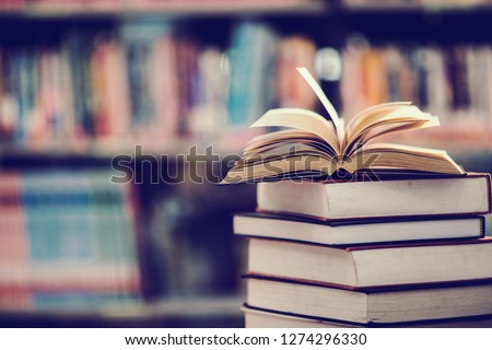 Book in library with open textbook,education learning concept Сток-фото © 