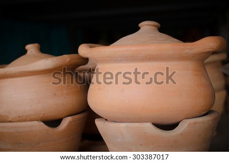 Handmade pottery on shelf in factory,still life