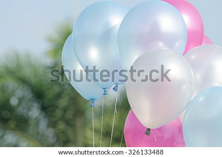 balloon with colorful on blue sky concept of love in summer and valentine, wedding honeymoon,congratulation