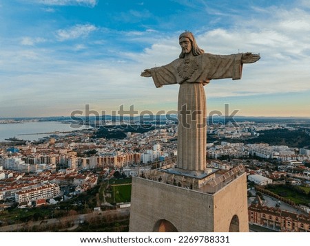 Similar – Foto Bild Ponte 25 de Abril Brücke in Lissabon während Sonnenuntergang mit Schiff und Jesus-Denkmal, bewölkten Himmel portugal