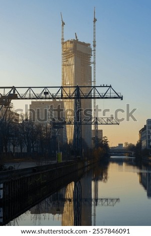 Similar – Image, Stock Photo High-rise buildings in Berlin at Potsdamer Platz with inserted moon