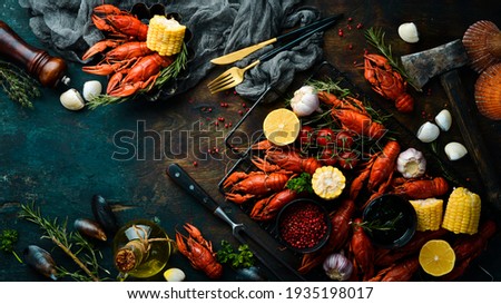 Beer party. Still life with crayfish crawfish on old wooden rustic background. Seafood. Top view. Flat lay. Photo stock © 