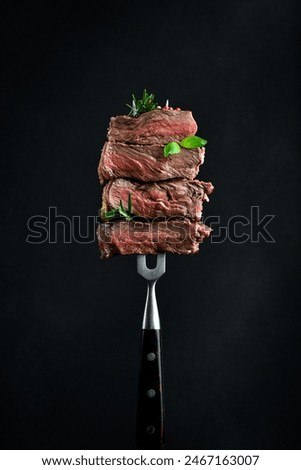 Foto Bild Steak auf einer Gabel