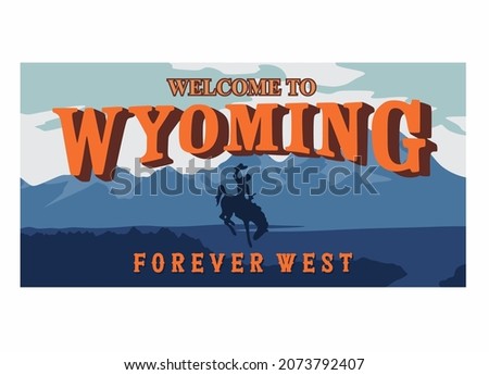 Welcome to Wyoming in a dark blue cowboy silhouette