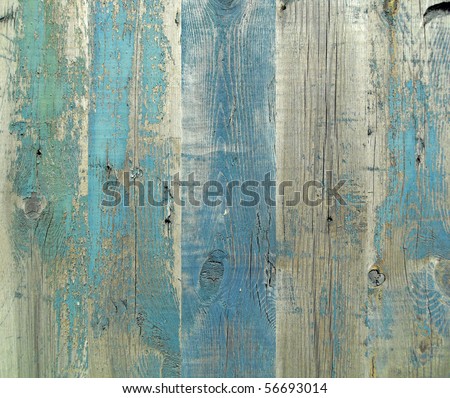 Wall from wooden planks with paint traces