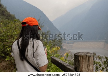Similar – Image, Stock Photo Anonymous woman on mountain enjoying nature