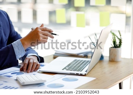 Businessman working at office with documents on his desk, doing planning analyzing the financial report, business plan investment, finance analysis concept Stockfoto © 