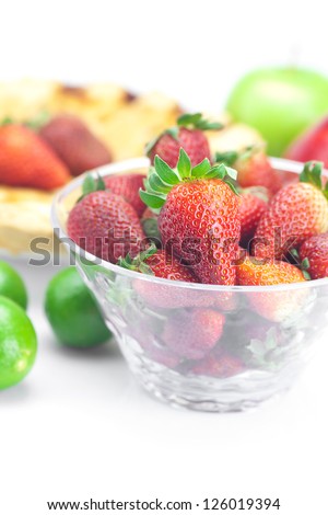 apple pie,lime, apples and strawberries isolated on white