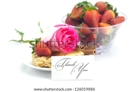 piece of apple pie, a card with the words thank you, cinnamon, pink rose, almonds and strawberries isolated on white