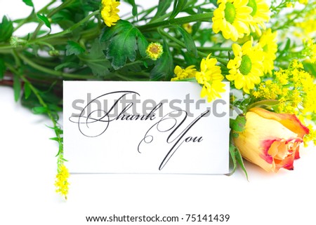 yellow red rose ,yellow field  flower and a card  with the words thank you isolated on white