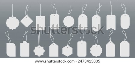 Set blank white paper price tags or gift tags. Paper labels with cord.