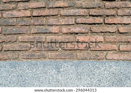 old brick with cement background