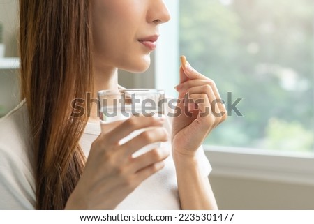 Similar – Image, Stock Photo Young Woman with Hands on Head in Blue Background Studio