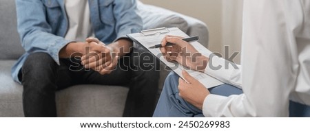 Similar – Image, Stock Photo doctor man taking a break, using mobile phone. Wearing protective gloves, mask and stethoscope. coronavirus covid-19 concept