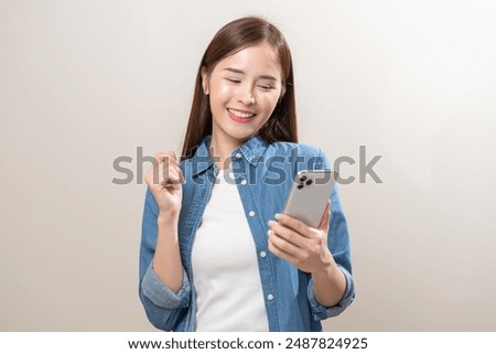 Similar – Image, Stock Photo Cheerful young woman using smartphone on resort
