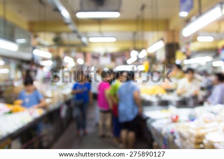blur image of big market in Chiangmai,Thailand for background