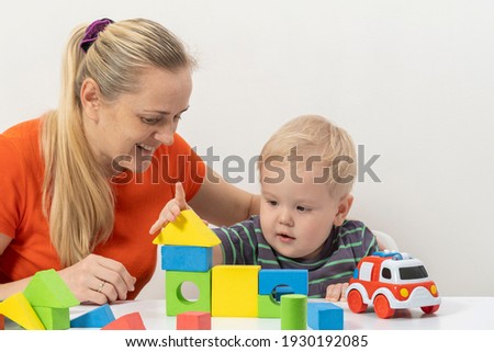 Similar – Image, Stock Photo Mother playing with toddler