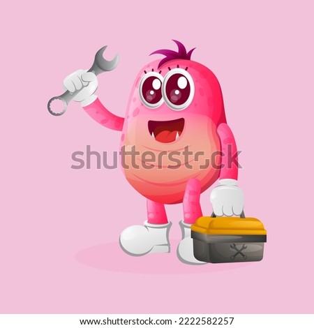 Cute pink monster holding spanner and tolls box. Perfect for kids, small business or e-Commerce, merchandise and sticker, banner promotion, blog or vlog channel
