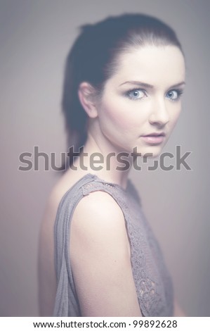 A quirky vintage style portrait of a shocked woman