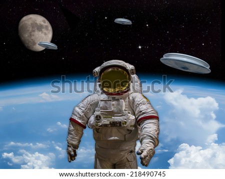 3 UFOs entering the earths atmosphere with the moon visible in the distance. An Astronaut in foreground. Welcome our new overlords! - Artist Impression