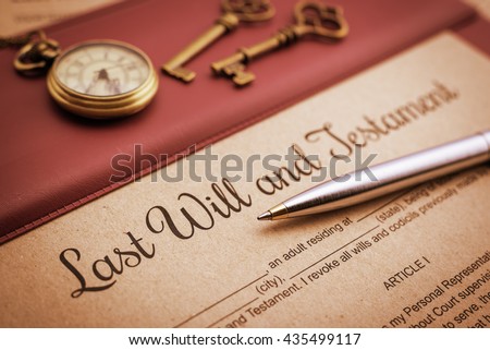 Vintage / retro style : Blue ballpoint pen, antique pocket watch, two brass keys and a last will and testament on a vinyl desk pad. A form is waiting to be filled and signed by testator / testatrix. Imagine de stoc © 