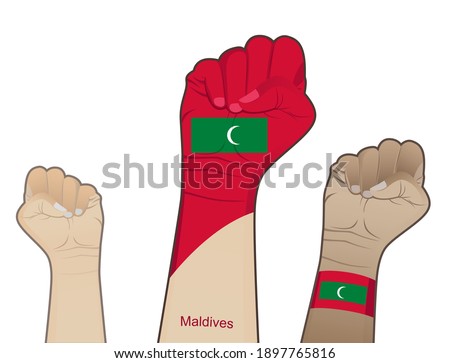 The spirit of struggle by lifting the hands with the Maldives flag