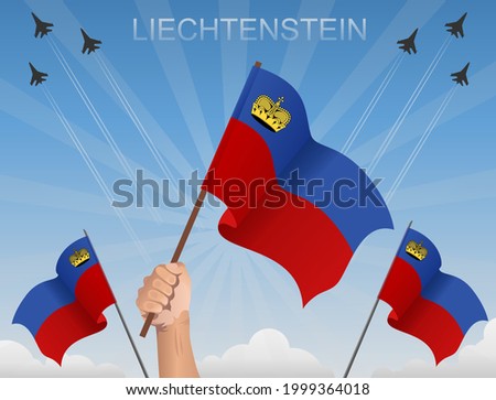 Liechtenstein flags fluttering under the blue sky