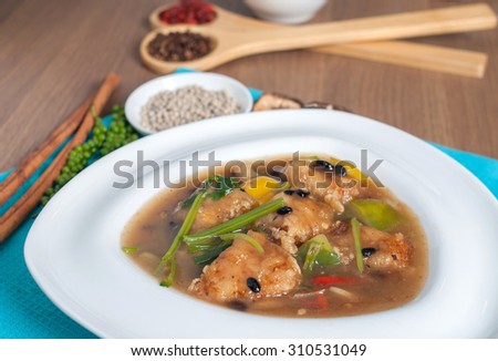 Noodle in fried bean fish topped pepper with decoration and background shooting menu set