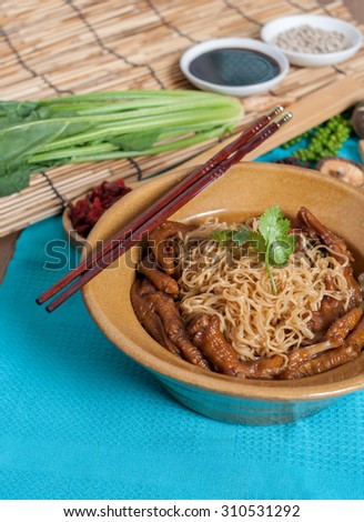 Braised goose feet with egg noodle menu chinese food shooting set menu with decoration and background