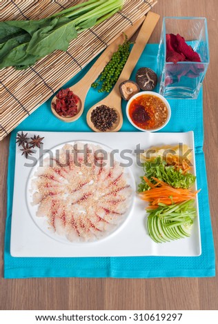 top view of sliced raw fish chinese style restaurant menu shooting set