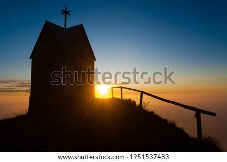 Dawn at the little church, mount Grappa landscape, Italy. Italian alps panorama Stock fotó © 