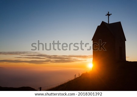 Dawn at the little church, mount Grappa landscape, Italy. Italian alps panorama Stock fotó © 