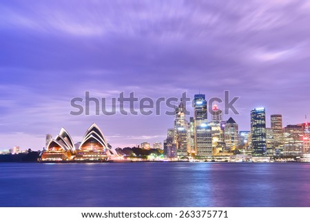 Sydney, Australia - January 23: Sydney Harbor and Opera House at twilight on January 23, 2015 in Sydney, Australia. The Opera House is one of the most famous performing arts centers in the world.
