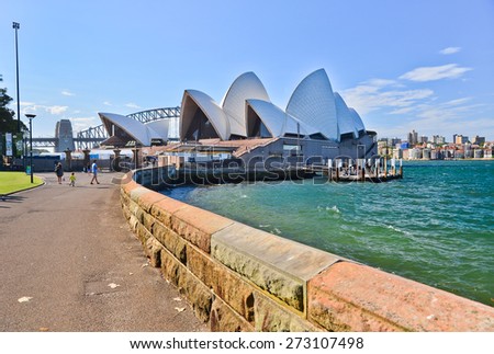 Sydney, Australia - January 23: Sydney Opera House and Harbor Bridge in a sunny day on January 23, 2015 in Sydney, Australia.