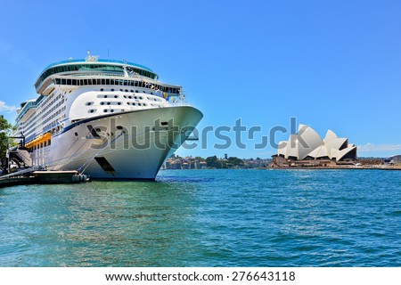 Sydney, Australia - January 25: Sydney Opera House and a cruise ship in Sydney Harbour on January 25, 2015 in Sydney, Australia.