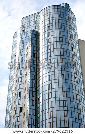 Samara, Russia, may 1, 2015 - sun, sky and clouds reflected in the Windows of a skyscraper called 