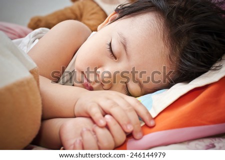 Asian girl sleeping on the couch, which was good