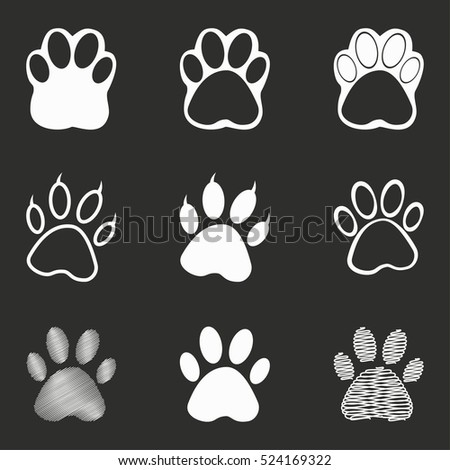 Paw Vector Icons Set. White Illustration Isolated On Black Background