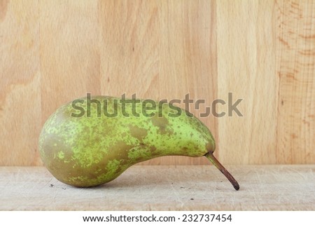 Pear on table